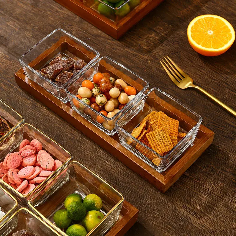 أطباق زجاجية شفافة/ذهبية مع صينية خشبية