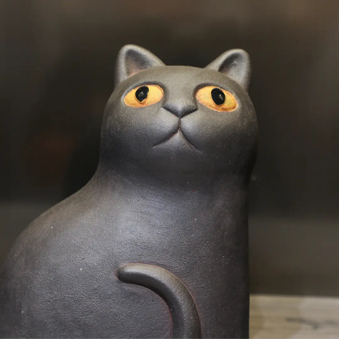 Big-Eyed Figurine – Whimsical Decorative Sculpture