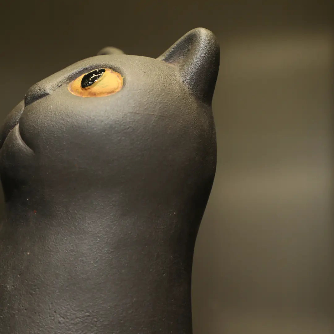 Big-Eyed Figurine – Whimsical Decorative Sculpture