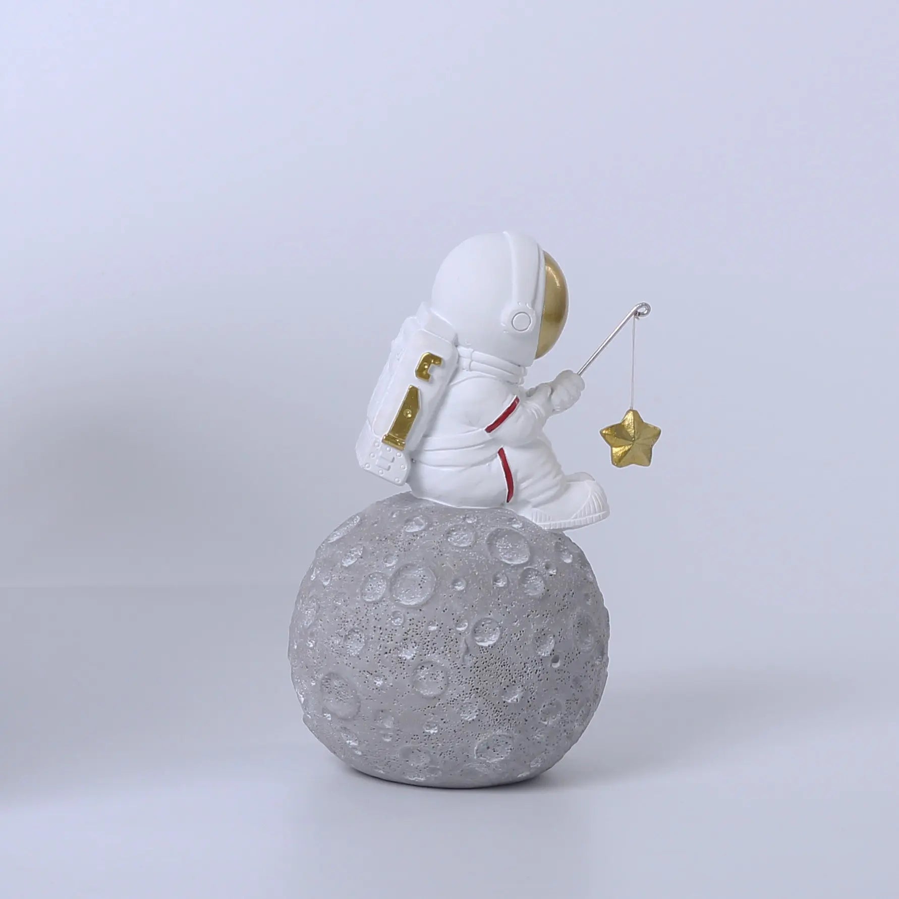 Astronaut Fishing for Golden Stars