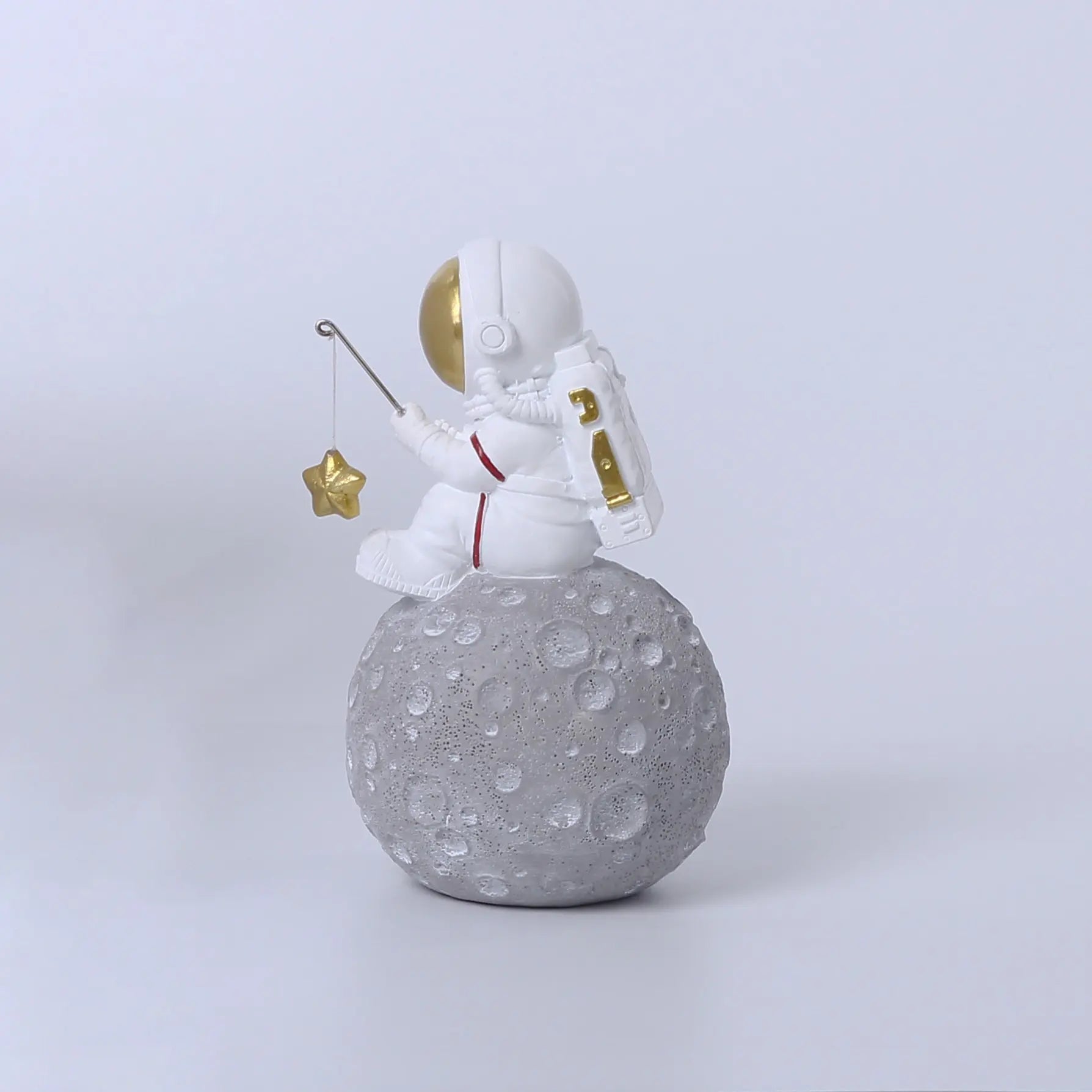 Astronaut Fishing for Golden Stars