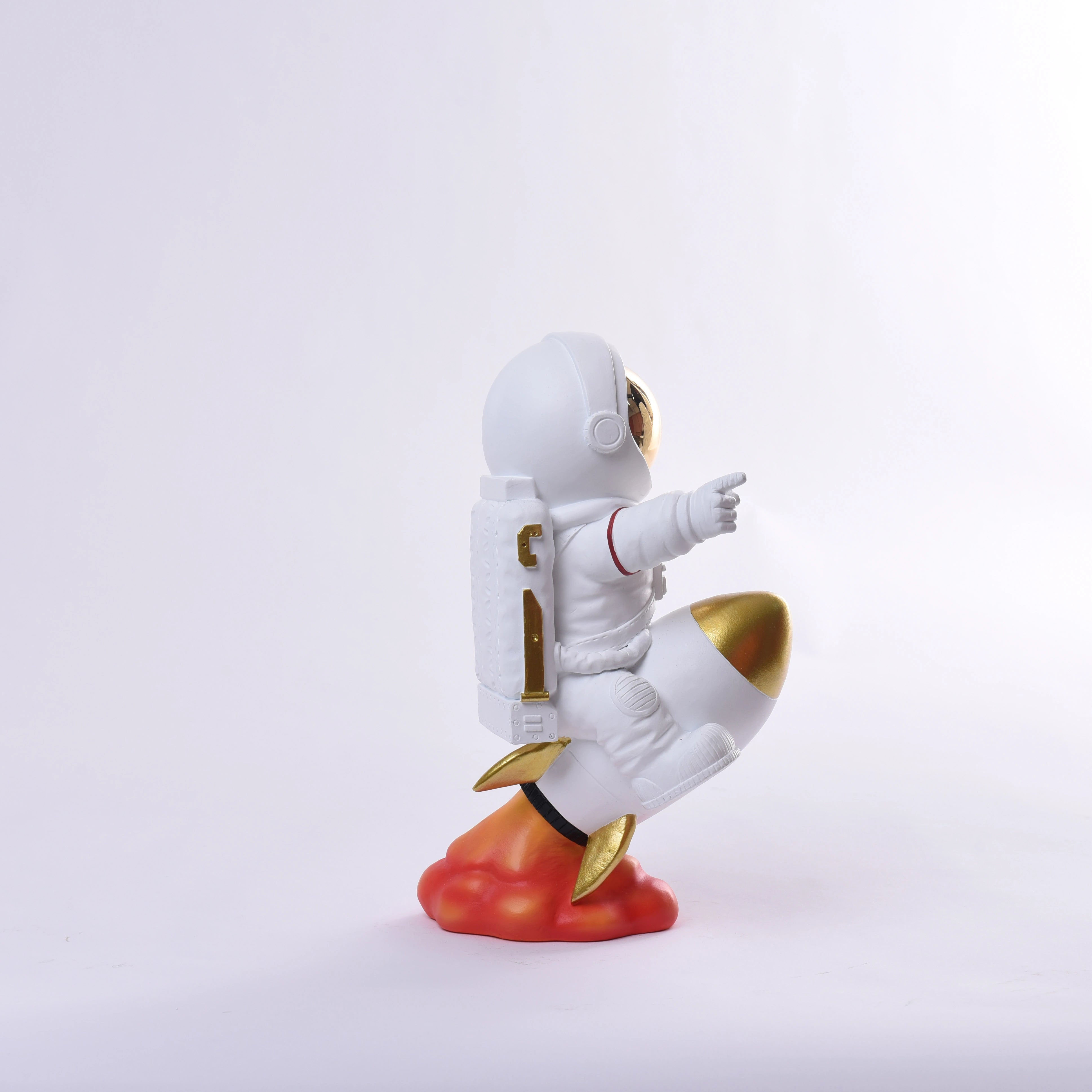 Astronaut on a Rocket Gold Figurines